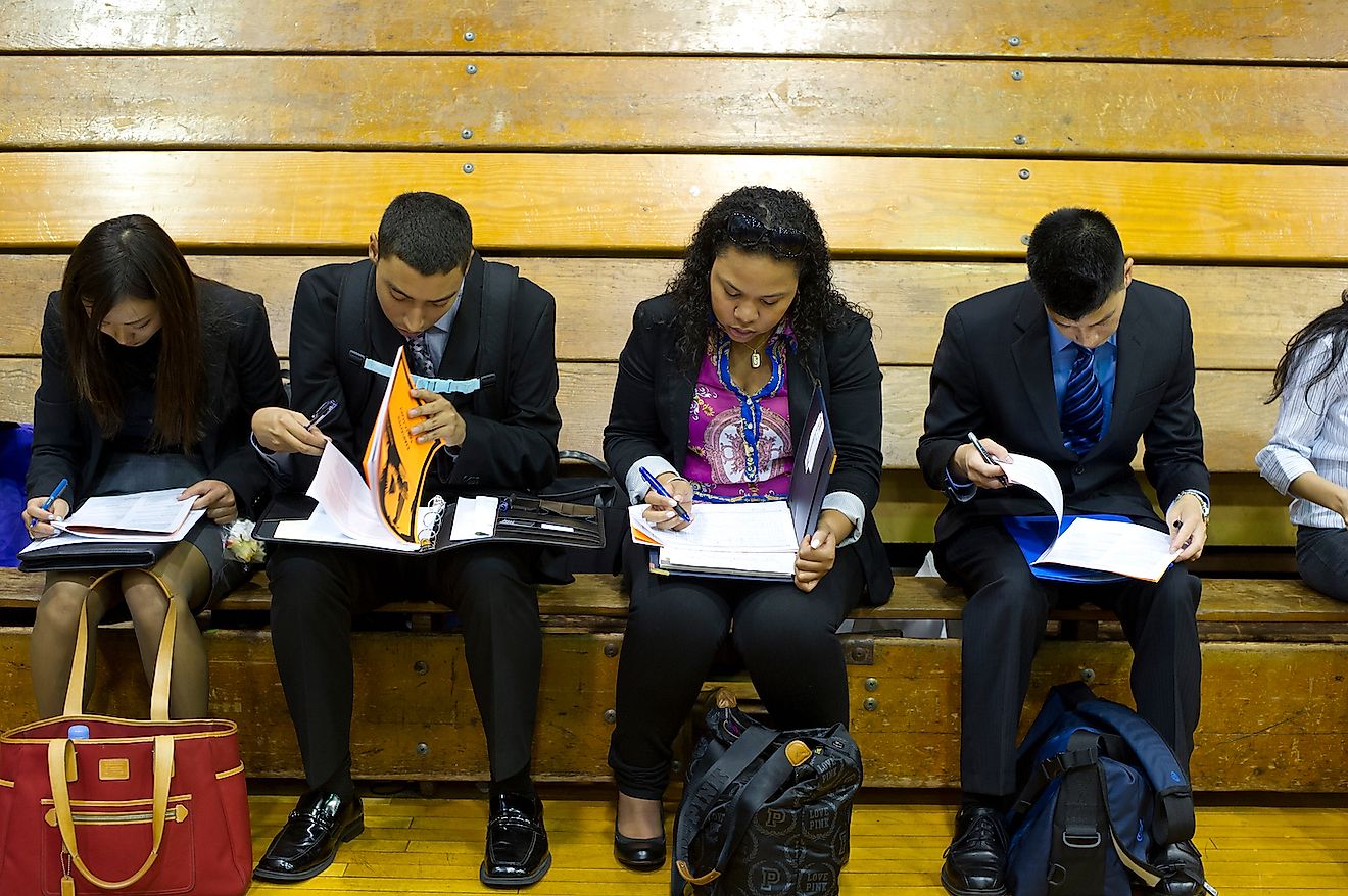 Job seekers attend a job fair in New York. Image credit: rblfmr/Shutterstock.com