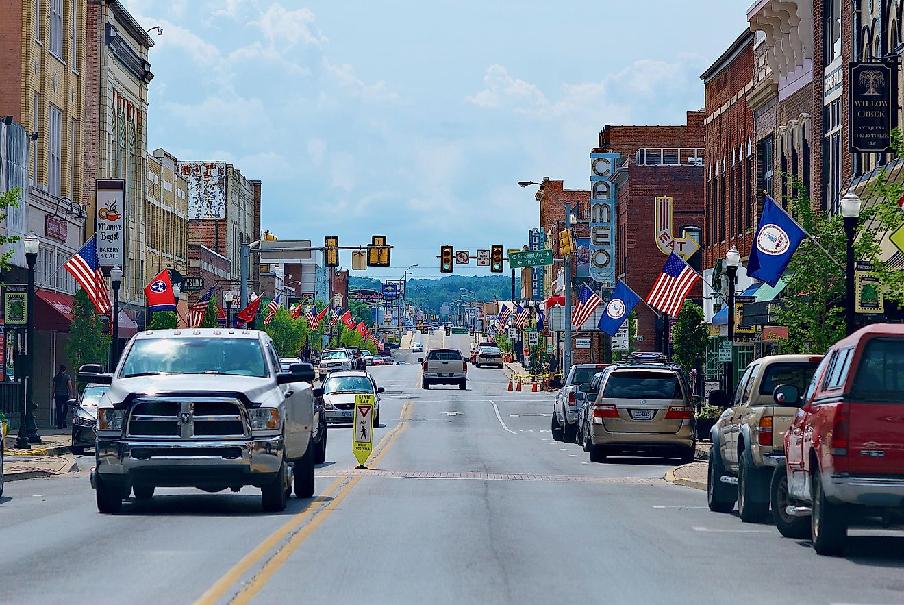  A pickup truck travels toward the camera on the Tennessee side of State Street in the separated cities of Bristol, Tennessee (l), and Bristol, Virginia (r).