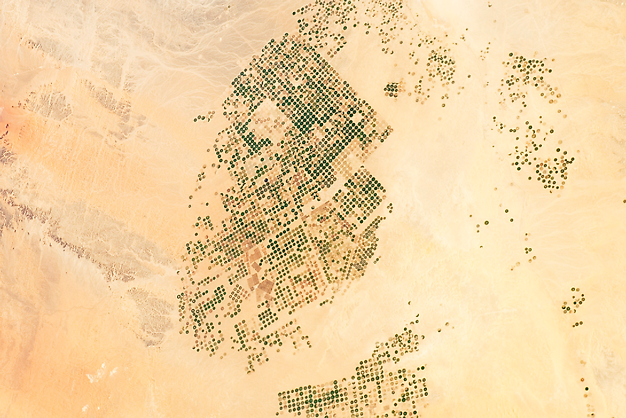Agricultural fields in the Wadi As-Sirhan Basin, Saudi Arabia. The largely deserted landscape results in poor home grown food crop production in the country.
