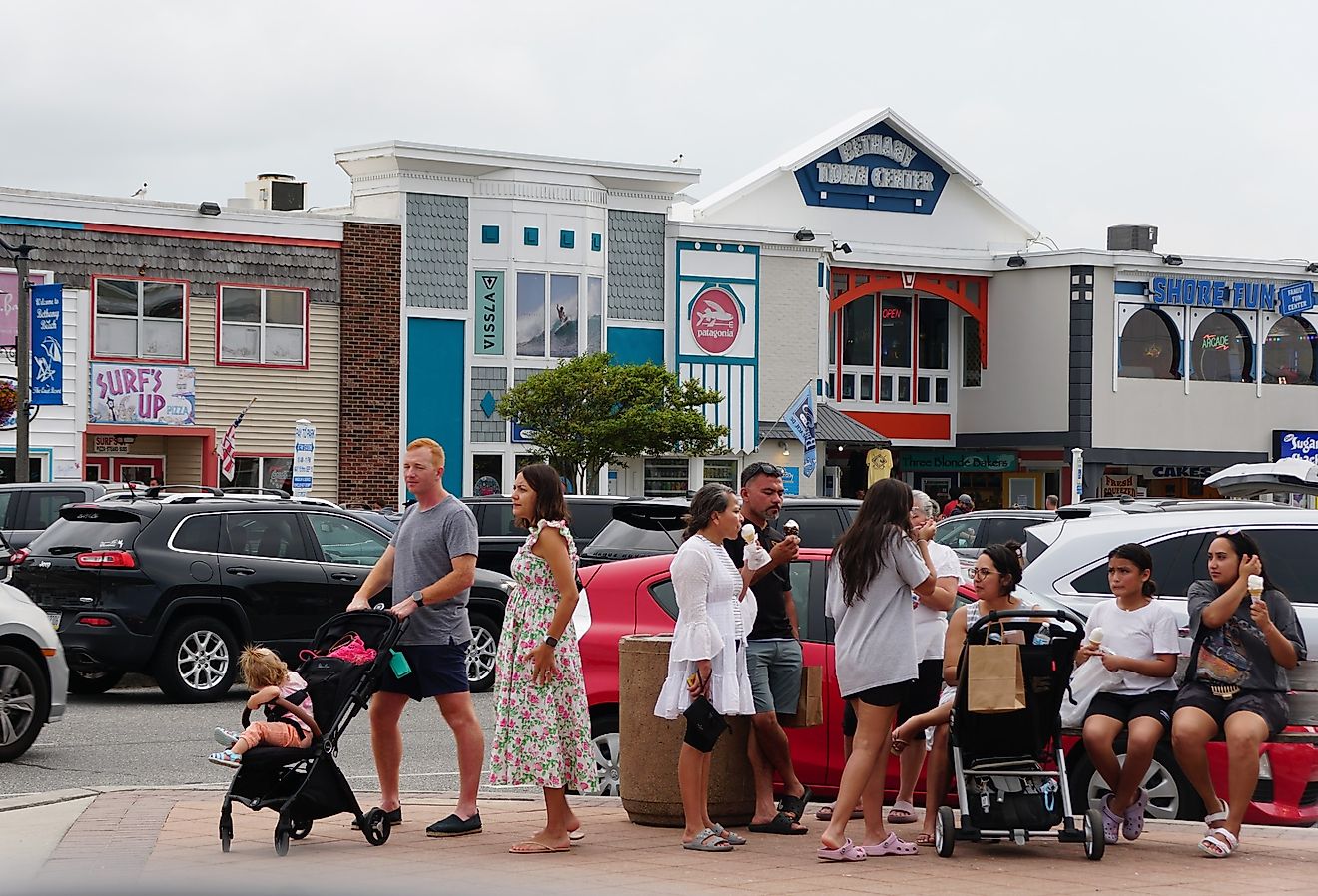 Visitors enjoying the warm summer day on on the street in Bethany Beach, Delaware. Image credit Khairil Azhar Junos via Shutterstock