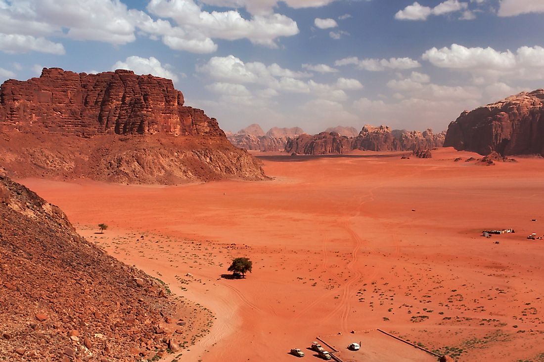 Valley of the Moon is known for its red sand and steeply sloping sandstone. Editorial credit: Alexey Pevnev / Shutterstock.com