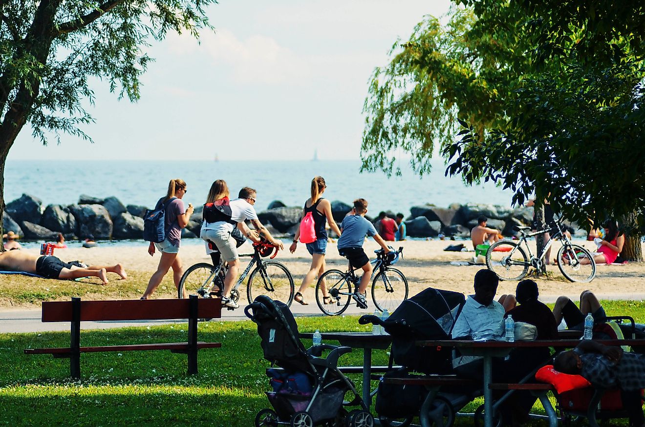 Visitors enjoying leisure time at Toronto Island in Lake Ontario. Image credit: edusma7256/Shutterstock.com