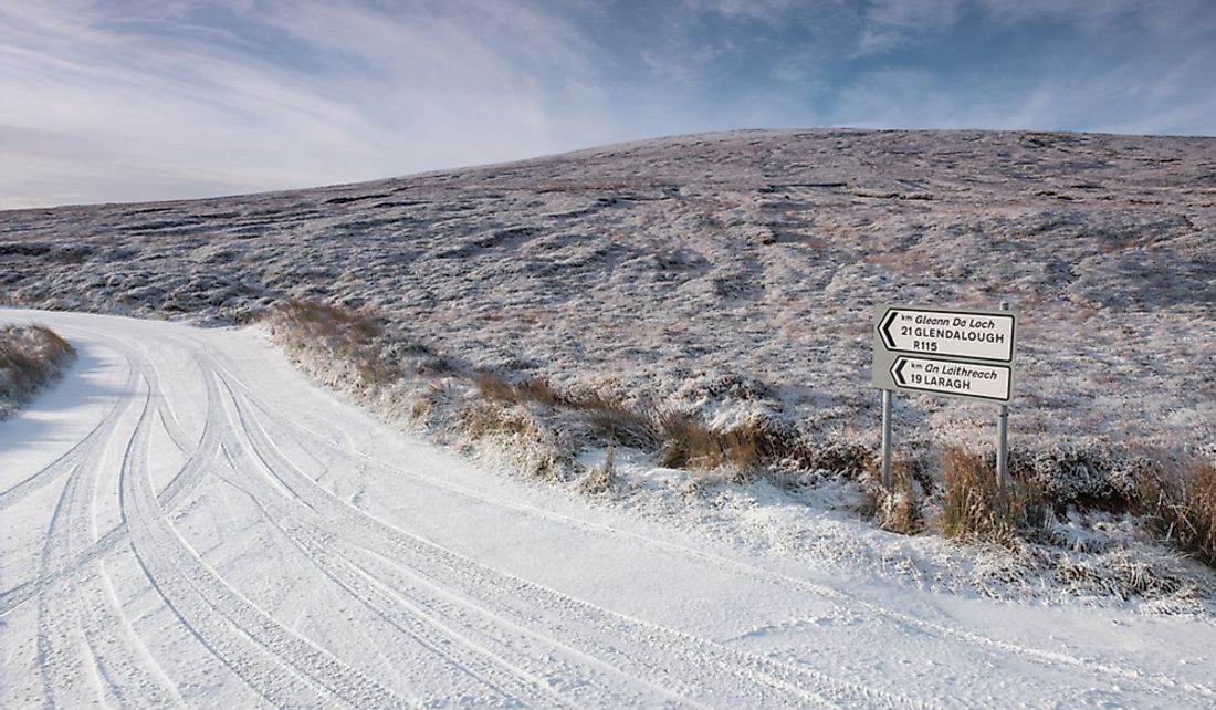 Snow covered road in Wicklow Mountains National Park in Laragh, County Wicklow, Ireland.