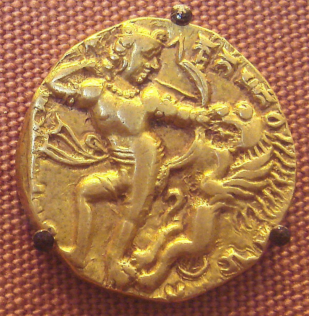 Gold coin of Gupta era, depicting a Gupta king holding a bow.