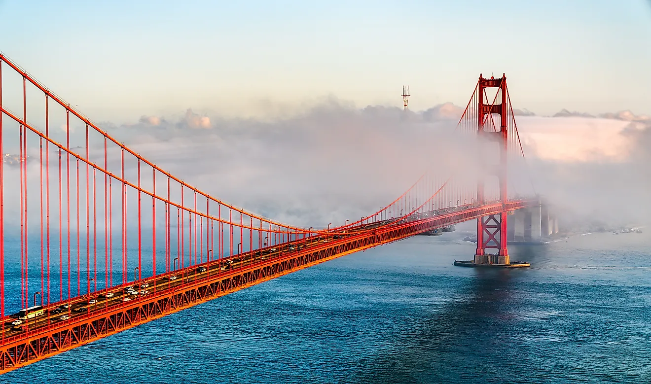 Golden Gate Bridge shrouded in fog overlooking the bay in San Francisco