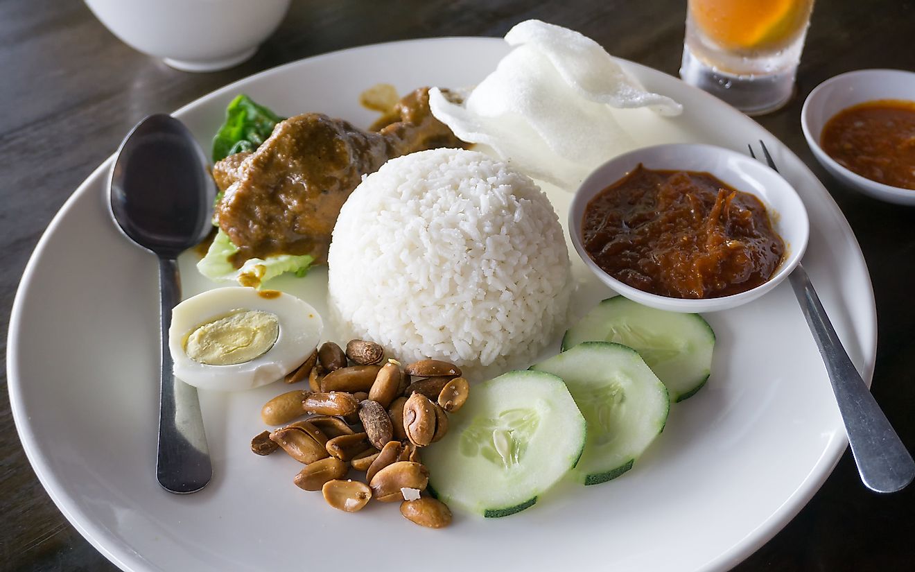 Nasi lemak served in the restaurant, famous Malaysia dish. Image credit: Nokuro/Shutterstock.com