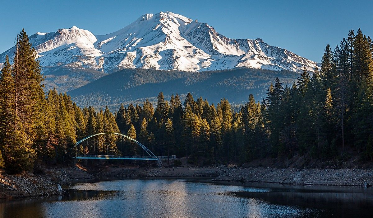 Mount Shasta and suspension bridge over Lake Siskiyou.