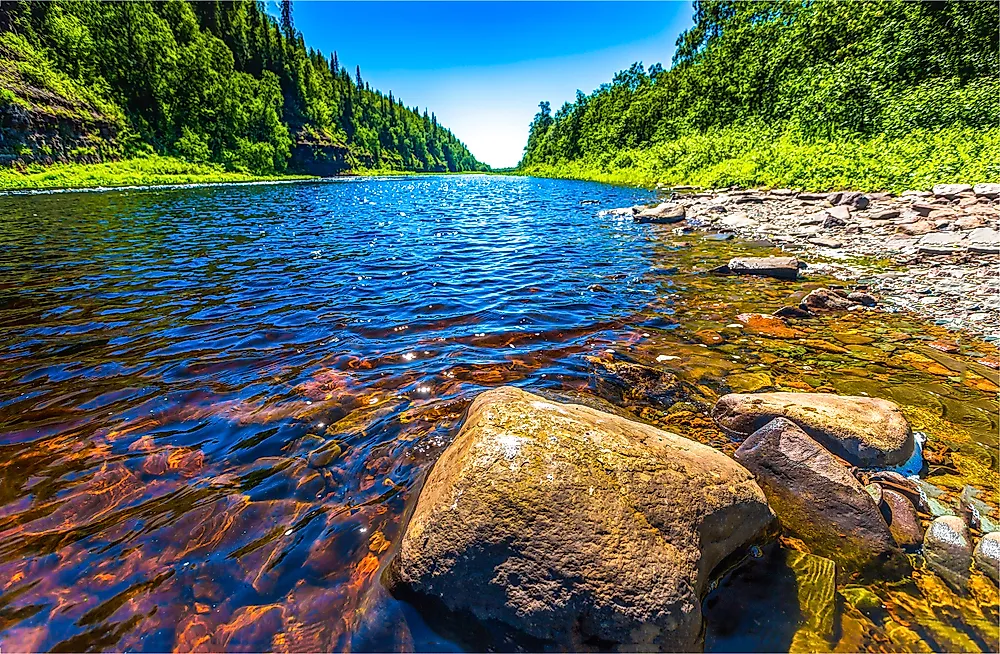 The size and shape of a river changes as flows downstream. 