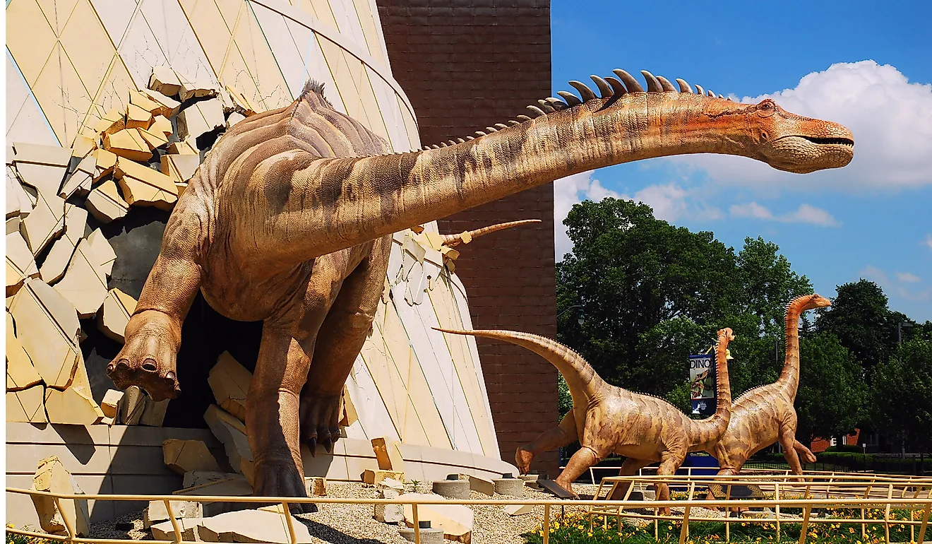  A dinosaur "breaks out" of the wall at the Indianapolis Children's Museum in Indianapolis, Indiana. Editorial credit: James Kirkikis / Shutterstock.com