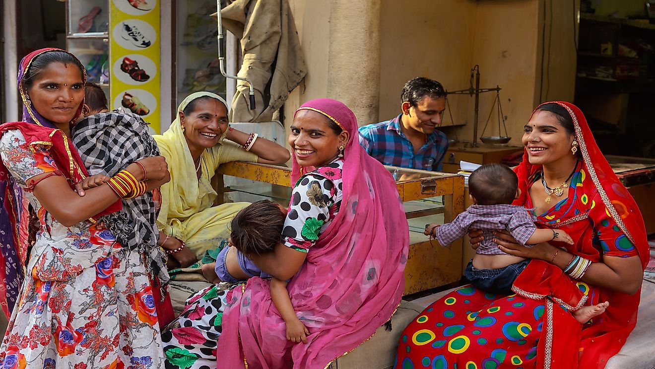 A group of Indian women with children.