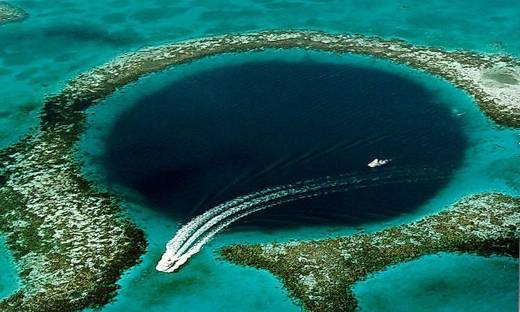 The Great Blue Hole, a giant submarine sinkhole off the coast of Belize, is a  popular spot among recreational scuba divers.