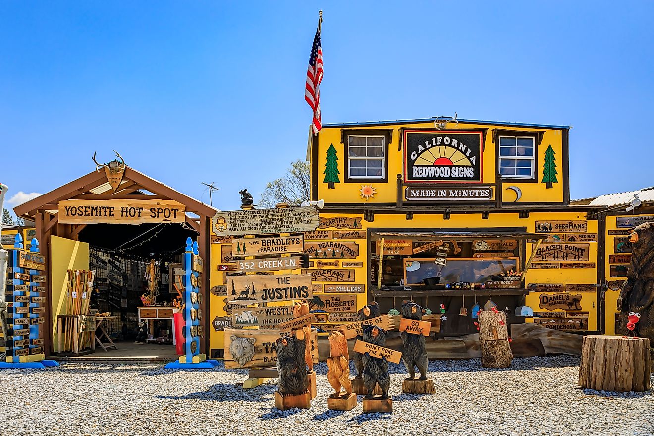 Brightly painted sign shop in Oakhurst, California.