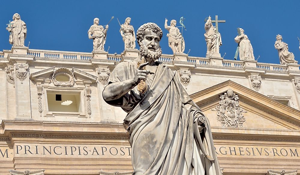 A statue of St. Peter in front of the Basilica Papale di San Pietro in Vatican City. Editorial credit: Evan El-Amin / Shutterstock.com