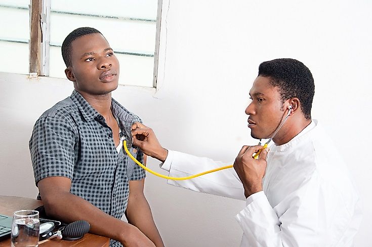 A Beninese doctor attends to a patient. With a scarcity of medical resources, it is thought that diabetes often goes underdiagnosed in Benin and much of Africa.