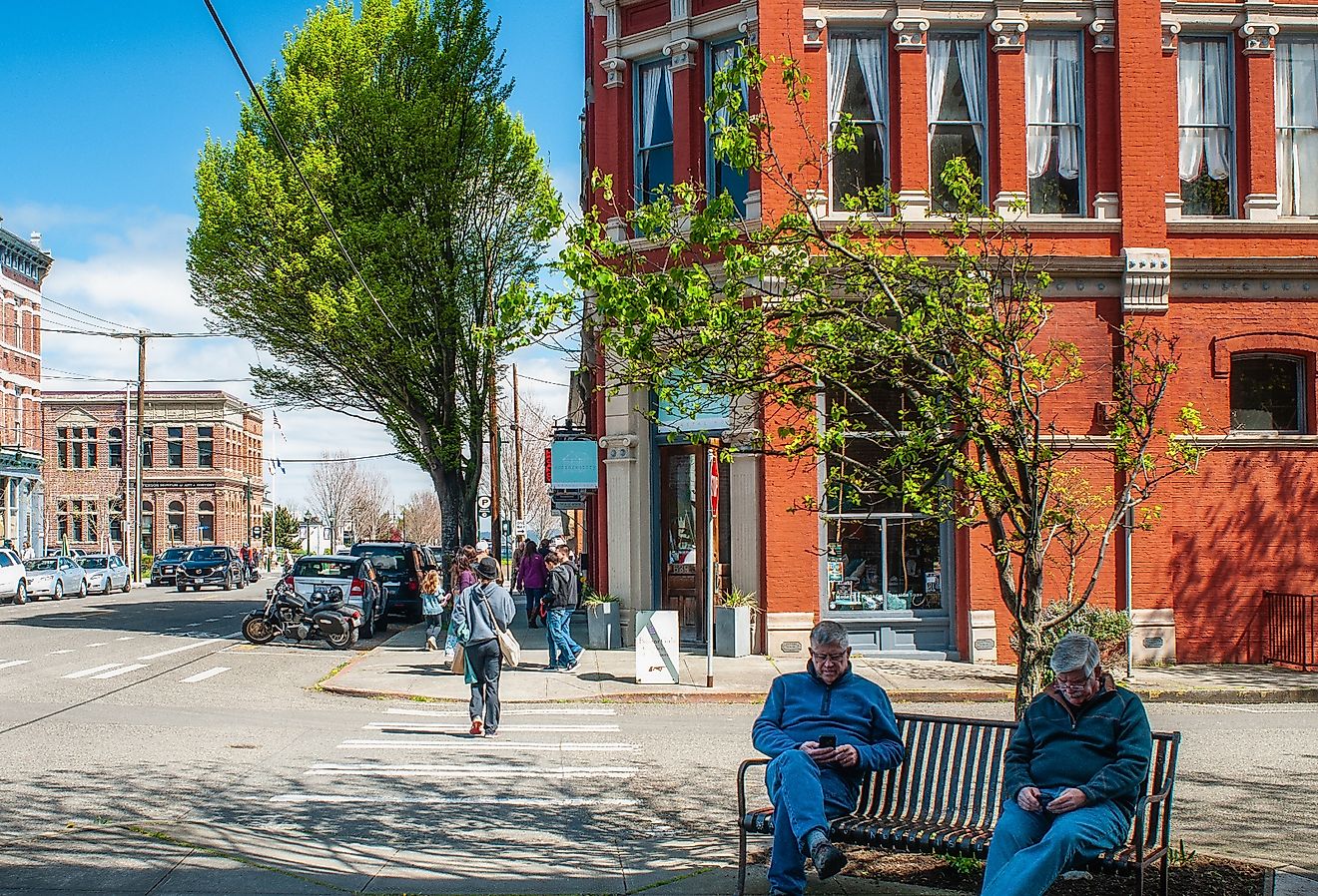 Older men sitting on a bench on Water Street in Historic Port Townsend, Washington. Image credit Gareth Janzen via Shutterstock