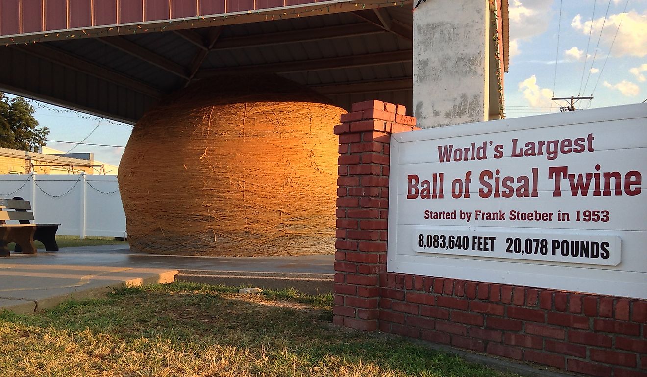 The world's largest ball of sisal twine sits proudly under a protective canopy in Cawker City, KS. Editorial credit: Larry Porges / Shutterstock.com