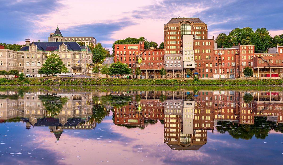 Augusta, Maine, skyline on the Kennebec River at twilight.