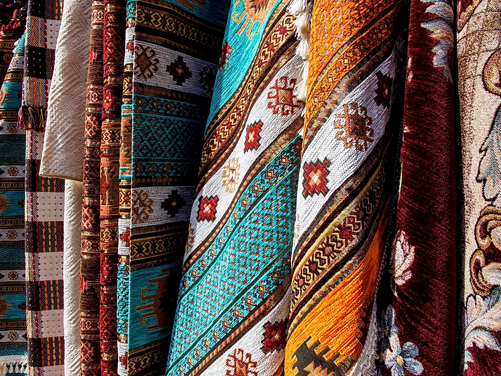 Bosnian carpets for sale at a market. 