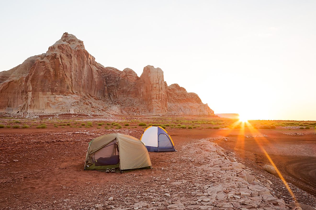 Morning Glow at Camp (On the Desert Shoreline of Lake Powell in Glen Canyon National Recreation Area). Image credit: Jim David/Shutterstock.com