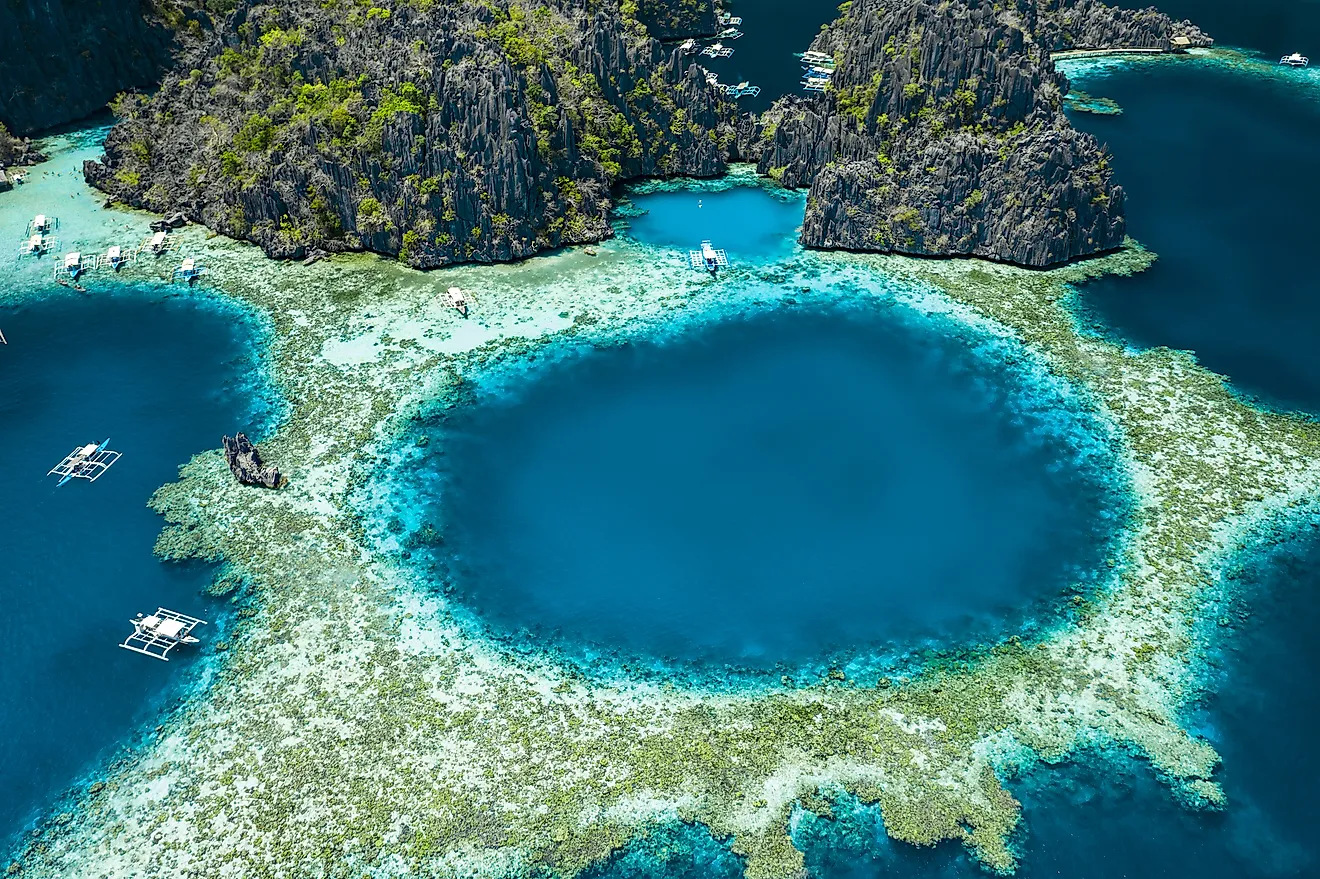 Aerial view of beautiful lagoons and limestone cliffs of Coron, Palawan, Philippines.