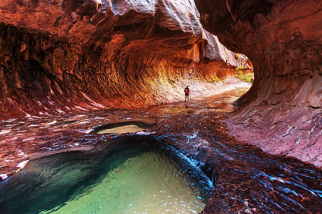 Zion National Park includes a variety of natural features like canyons, monoliths, mountains, and rivers.