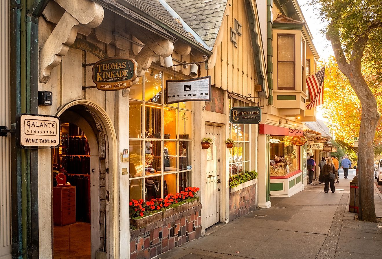 Small boutique stores along the sidewalk in Carmel by the Sea, California. Image credit Robert Mullan via Shutterstock