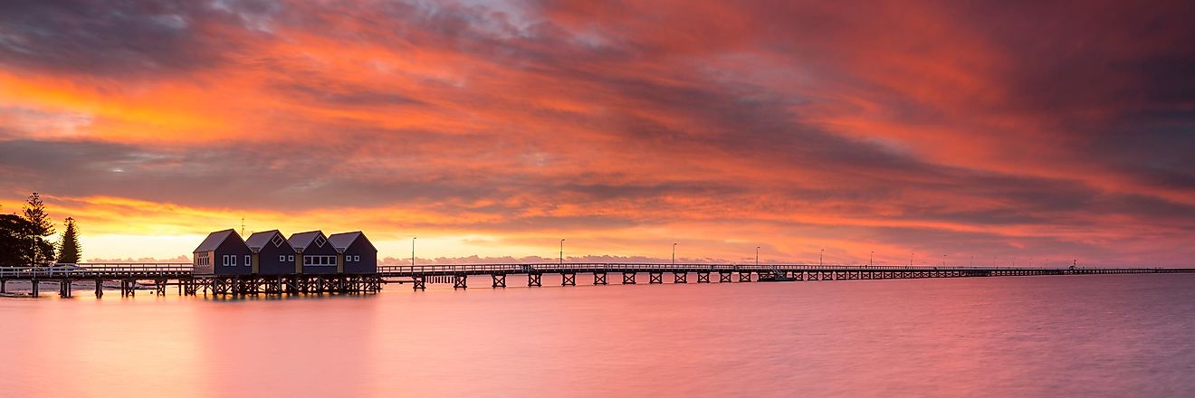 Fiery sunset over the top of the renowned Busselton Jetty in Western Australia.