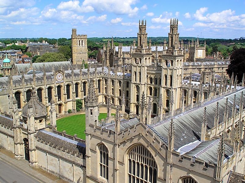 A view from above of the courtyard greenspace and Gothic architecture of Oxford University’s All Soul’s College.