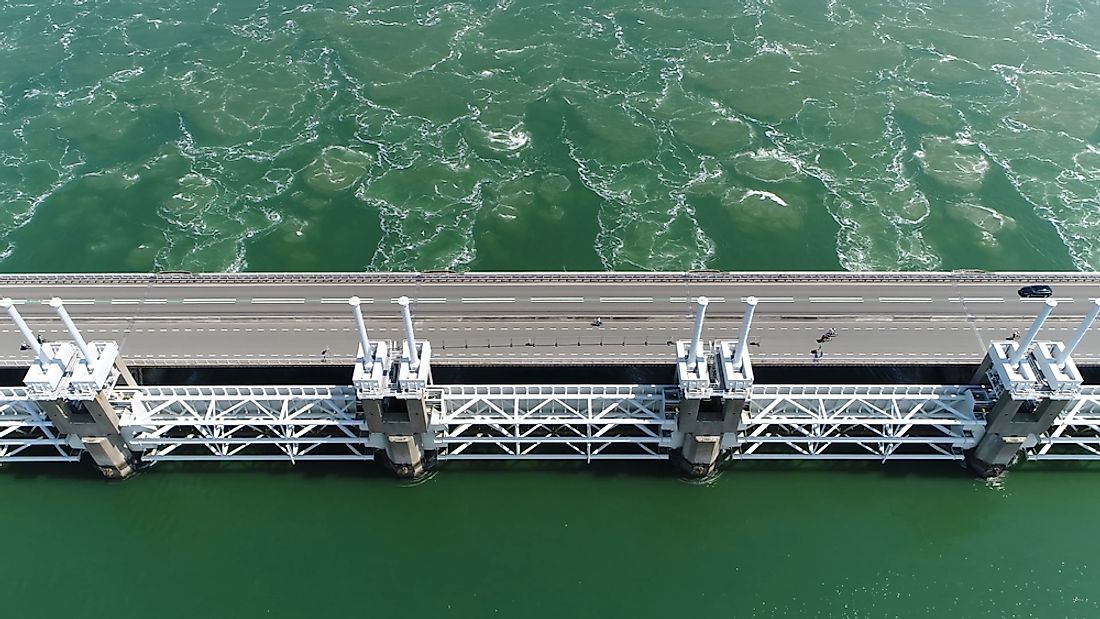 The Delta Works is a series of dams built to protect the country of the Netherlands, which is at a low elevation, from the flooding of water from the North Sea.