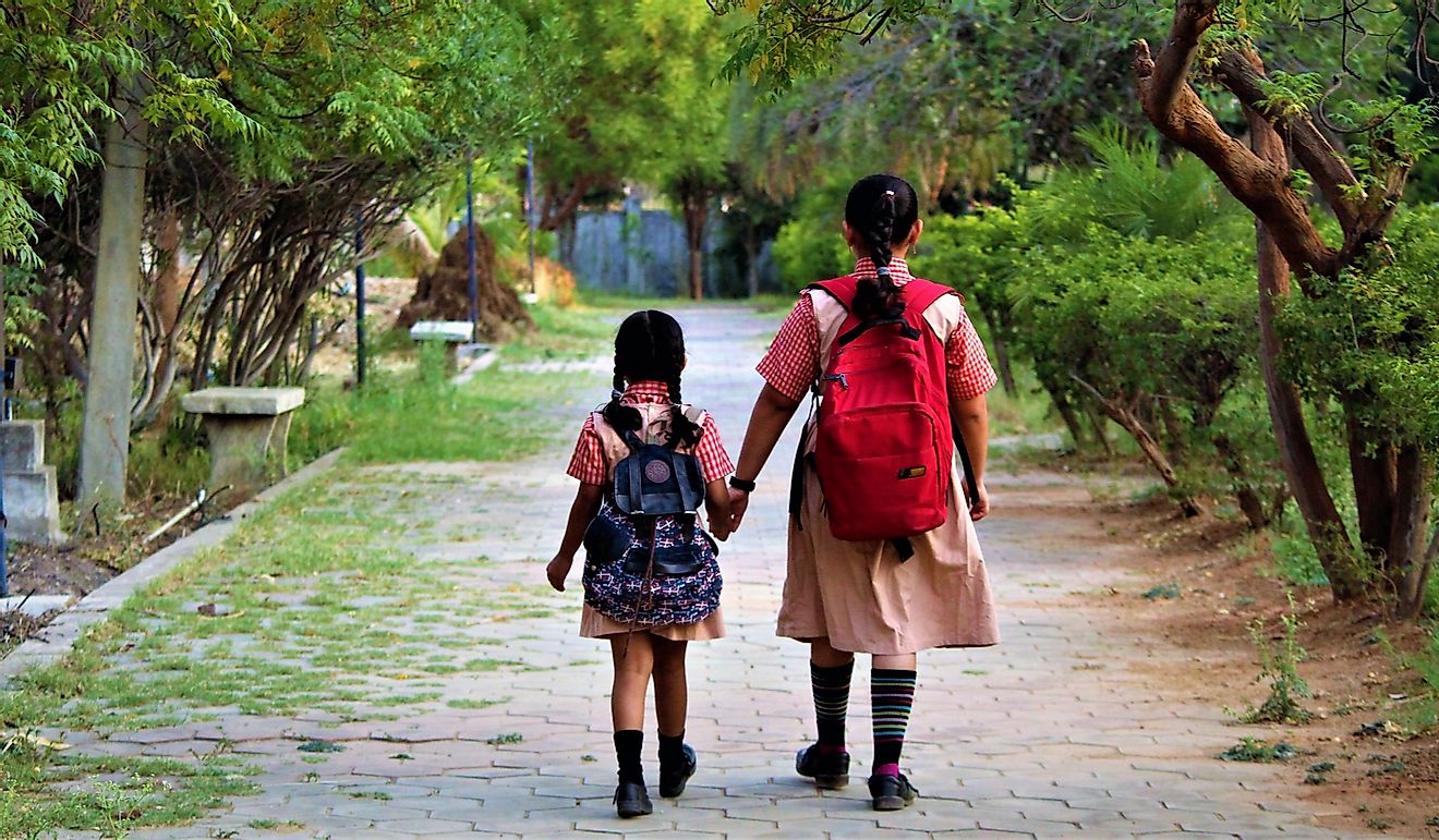 Schoolgirls in India walking their way to school.