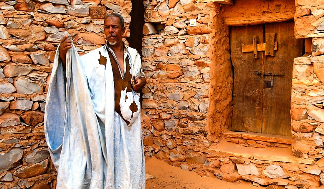 Mauritanian man wearing traditional boubou or derraa.  Editorial credit: Homo Cosmicos / Shutterstock.com