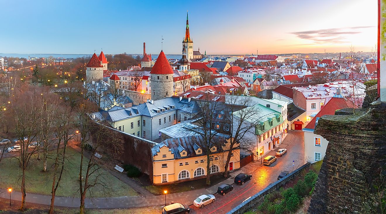 Aerial panoramic cityscape with Medieval Old Town, St. Olaf Baptist Church and Tallinn City Wall in the morning, Tallinn, Estonia. Image credit: Kavalenkava/Shutterstock.com