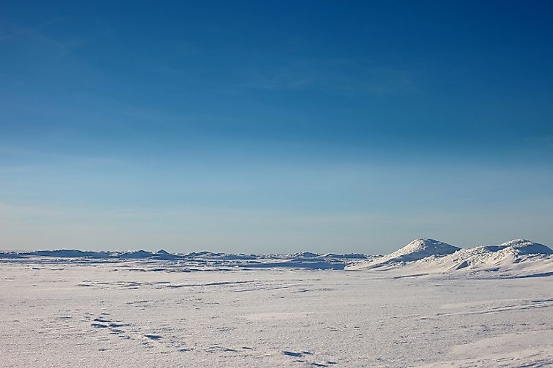 Vast expanses of lifeless, brutally cold, Antarctic Desert.