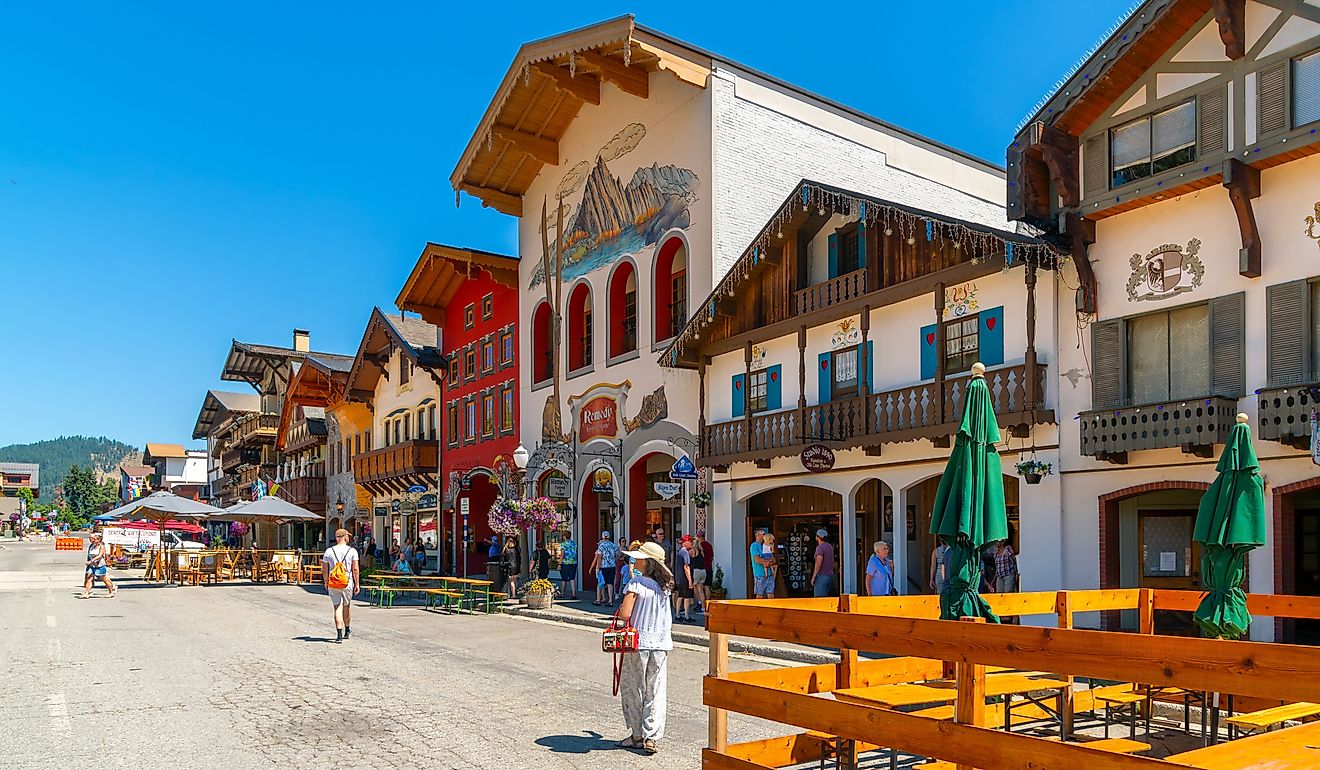  Shops and sidewalk cafes line the quaint Bavarian themed main street of the tourist resort town of Leavenworth, in the mountains of Central Washington State. Editorial credit: Kirk Fisher / Shutterstock.com