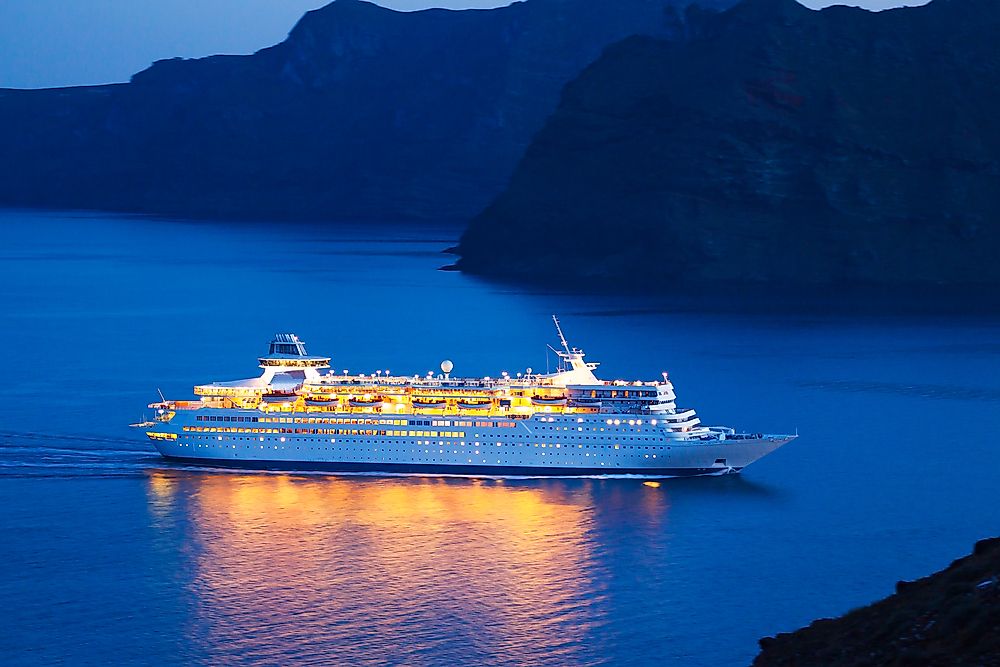 A cruise ship in the Mediterranean Sea at night.
