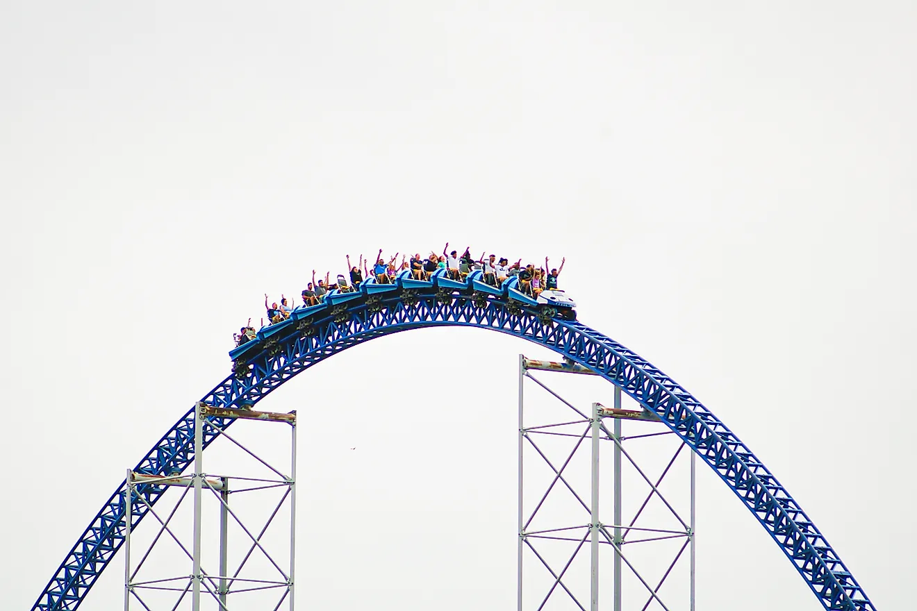 The train of Millennium Force crests a hill at Cedar Point in Sandusky, Ohio. Via Shutterstock / CJDPhotos