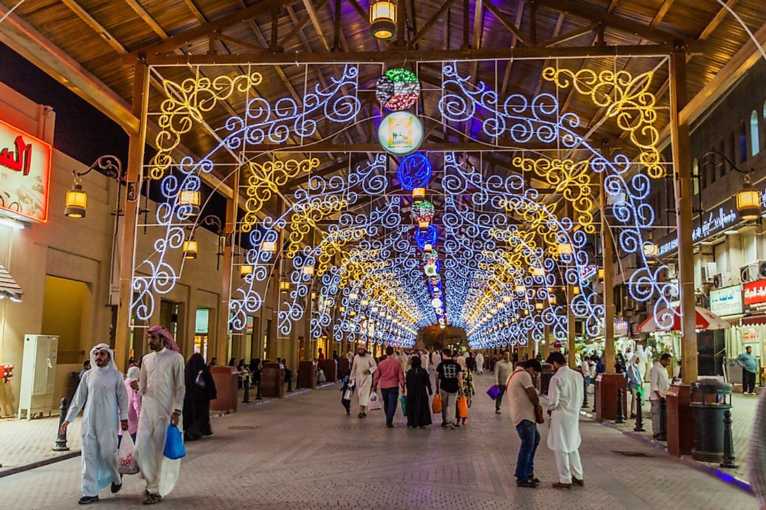 People walk in Kuwait City, Kuwait. Editorial credit: Matyas Rehak / Shutterstock.com. 