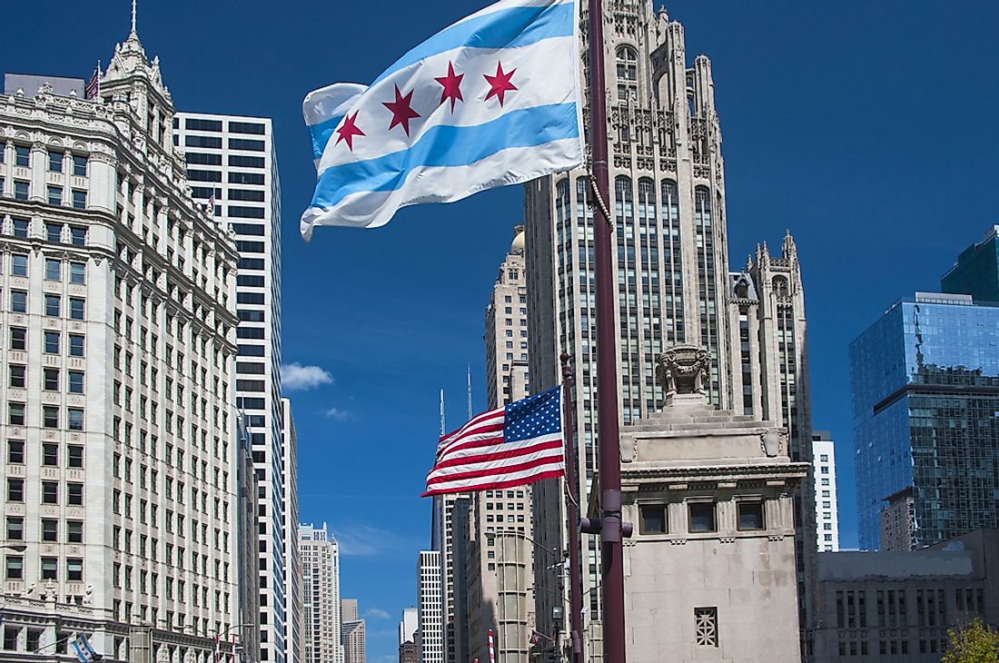 Downtown Chicago with the flag of the city in view. 