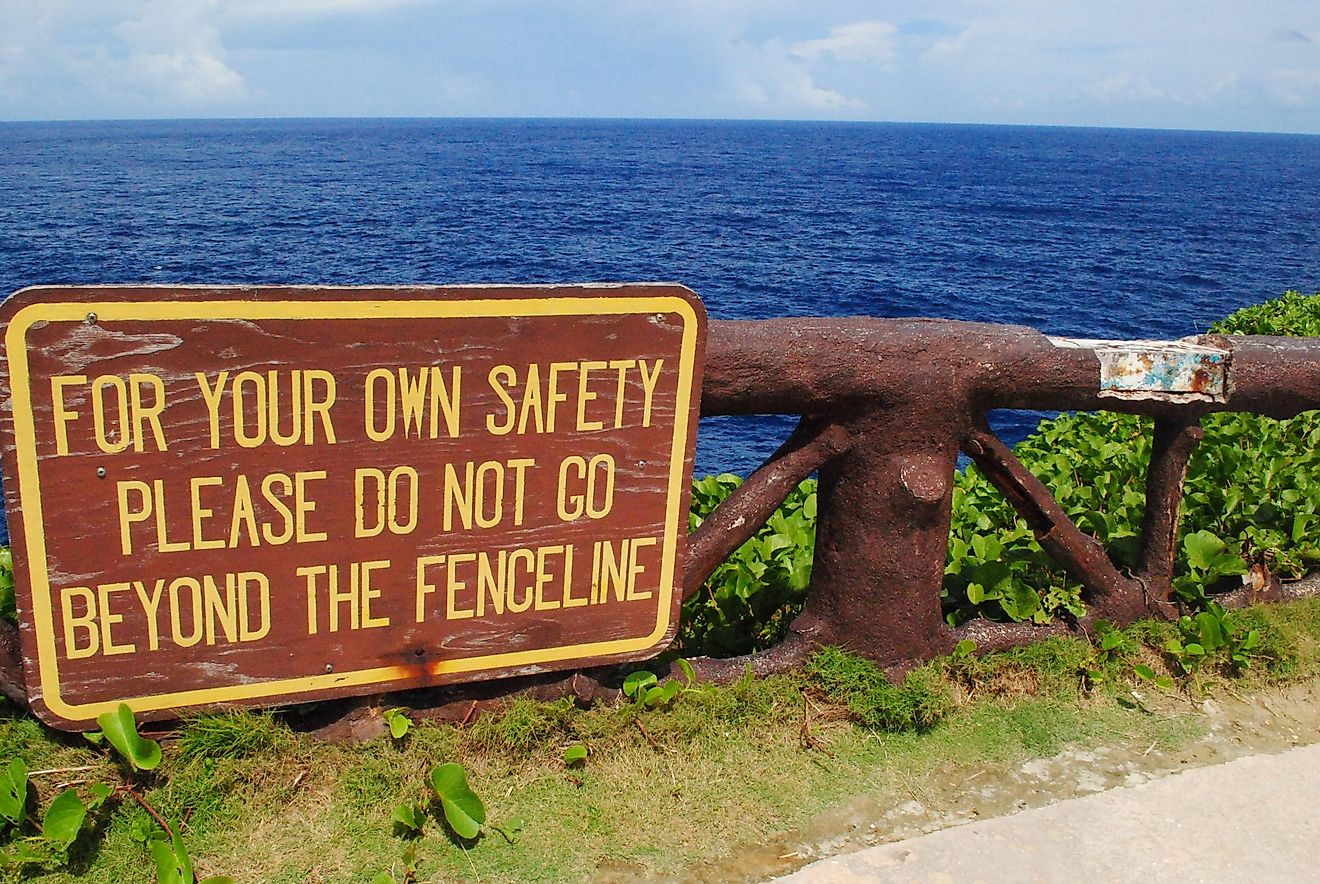 Sign on the railings at Banzai Cliff, a World War 11 historical site on Saipan, Northern Mariana Islands.