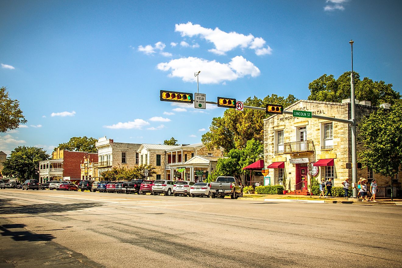 Fredericksburg, Texas : The Main Street in Frederiksburg, Texas, also known as "The Magic Mile", with retail stores and poeple walking