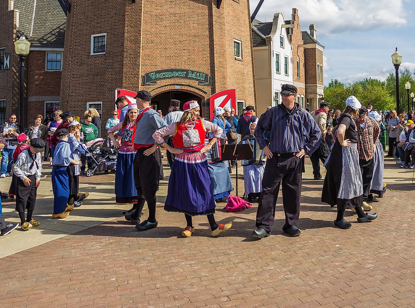 Folk dance in traditional Dutch costume during the Tulip Time Festival in Pella, Iowa, USA. Editorial credit: yosmoes815 / Shutterstock.com