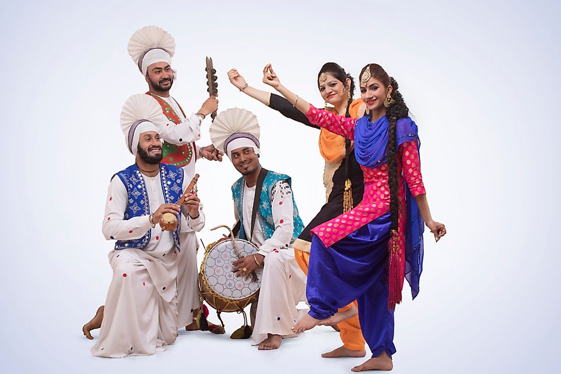 A Bhangra dance ensemble from India with their accompanying musicians.