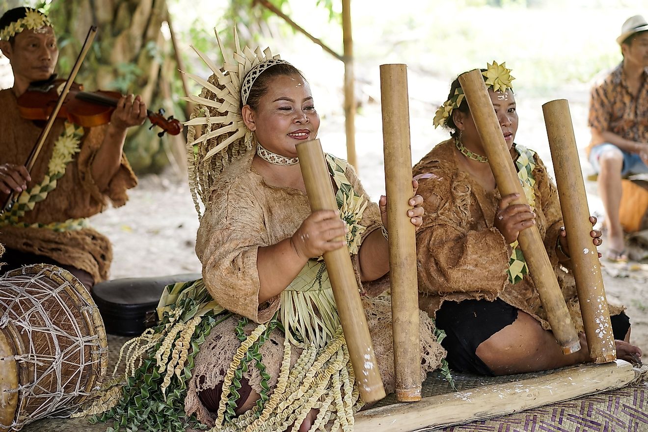 The Mah Meri tribe plays traditional musical instruments during the celebration of Hari Moyang (Ancestors Day) at Pulau Pulau Carey, Klang, Malaysia. Image credit: Sallehudin Ahmad/Shutterstock.com