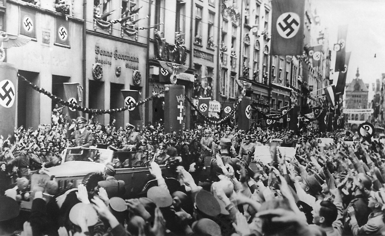 Danzig (Gdansk) greets the Fuhrer on Sept. 19, 1939. German Chancellor, Adolf Hitler receives Nazi Salutes as his rides in victory through Danzig. Image source: Everett Collection/Shutterstock.com