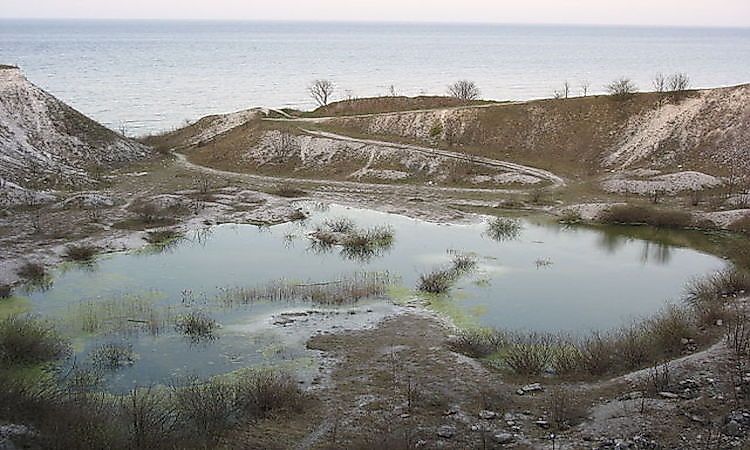 Stevns Klint in Zealand, Denmark is a natural UNECO World Heritage Site that is famous for its rich fossils.