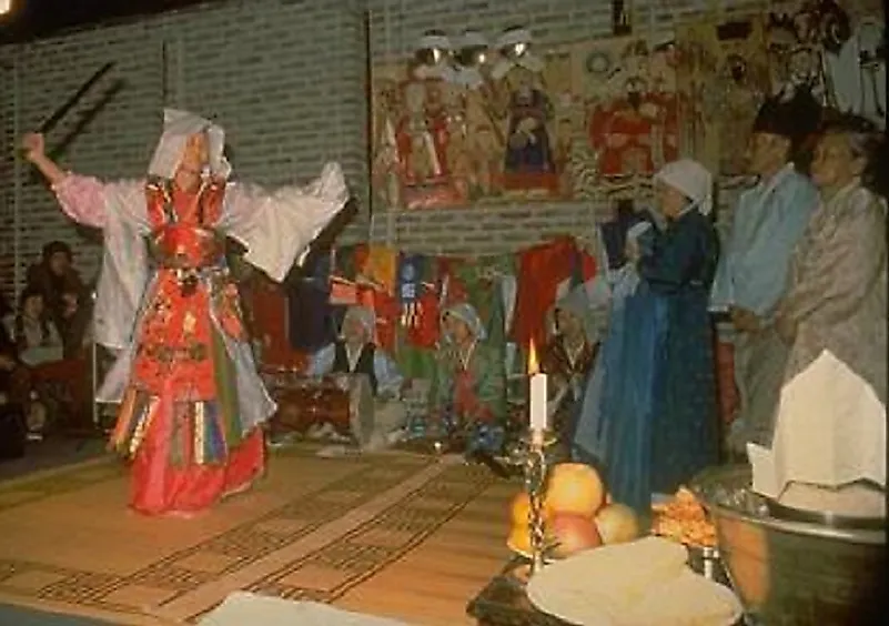 A Korean Shaman carrying out a traditional ritual.