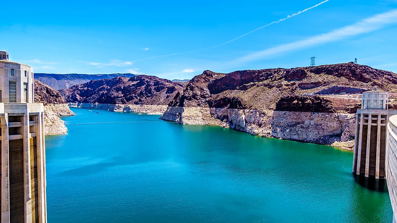 Low water level in Lake Mead and two Intake Towers that supply the water from Lake Mead to the Powerplant Turbines of the Hoover Dam hydroelectric power station 