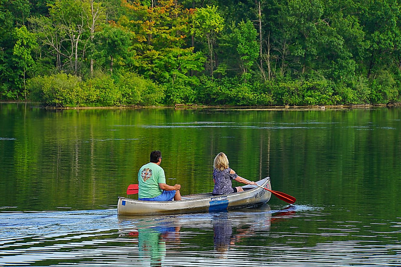 A couple canoeing in Metamora, Michigan, just an hour from Detroit. Editorial Credit: Fsendek, Shutterstock.com