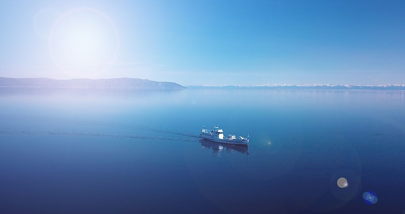 Aerial view of a ship floating in the water. Lake Baikal. Blue water.