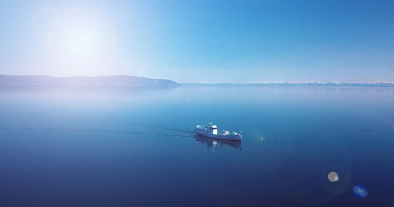 Aerial view of a ship floating in the water. Lake Baikal. Blue water.